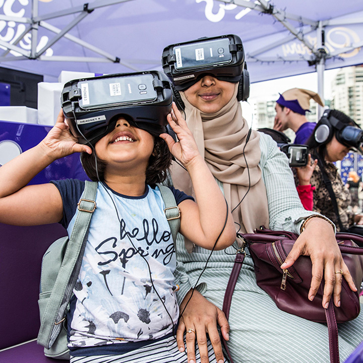 Mother and Daughter enjoying a VR experience in the Cadbury experience set.